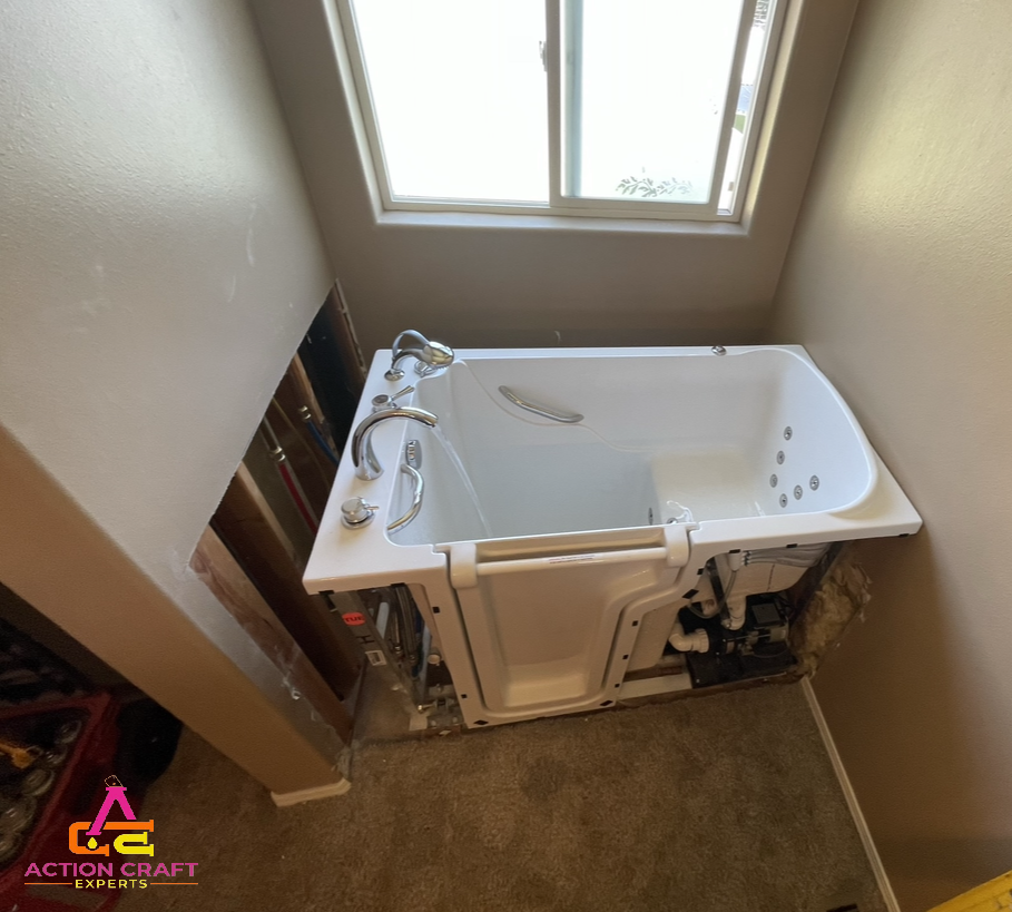 Spokane plumbers installing a new bathtub as part of a bathroom remodel